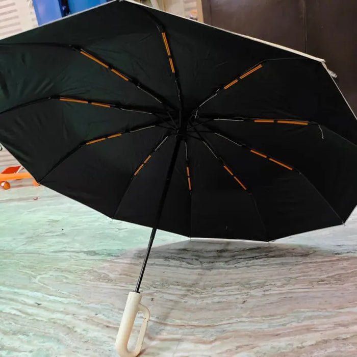 Photo d'un client : parapluie Nuvya StormHook ouvert, poignée blanc cassé